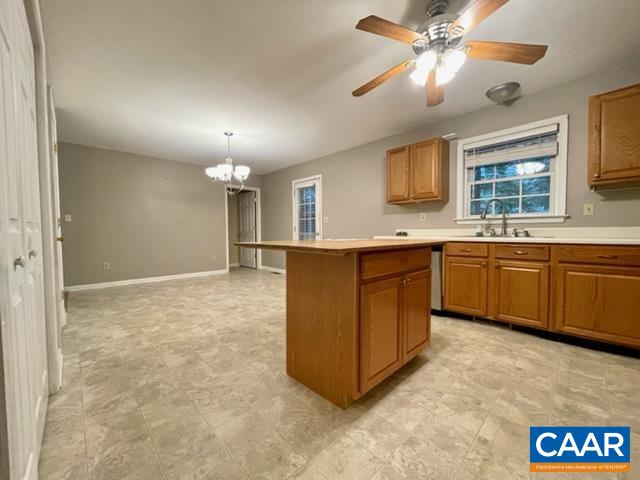 13 Riverside Drive Palmyra, VA 22963 - Photo 7 of 25 a view of a kitchen center island and stainless steel appliances