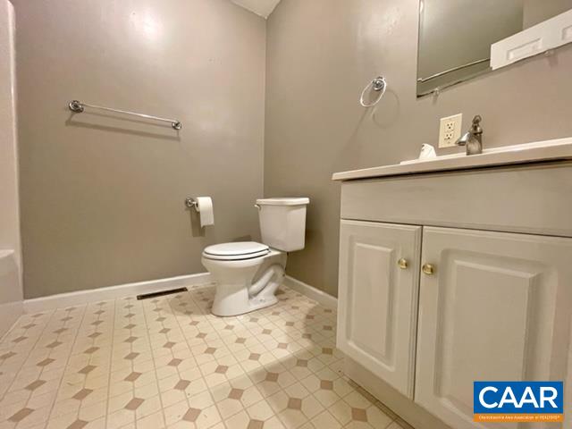 13 Riverside Drive Palmyra, VA 22963 - Photo 10 of 25 a bathroom with a sink a toilet and shower