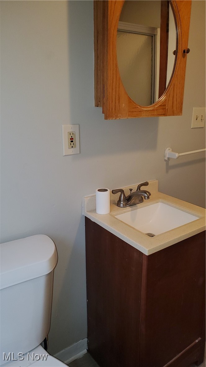 17610 Brazil Road Cleveland, OH 44119 - Photo 13 of 50 Bathroom with vanity and toilet