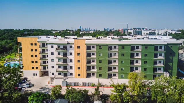 a view of a building with a garden