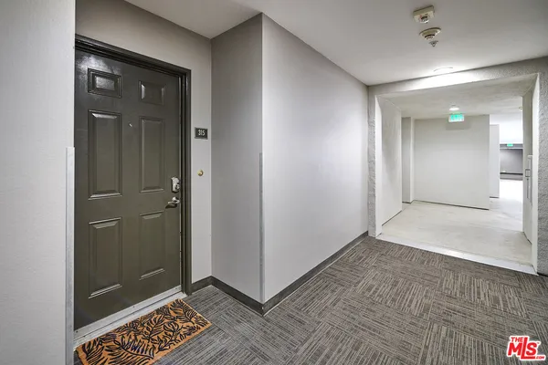 a hallway with windows