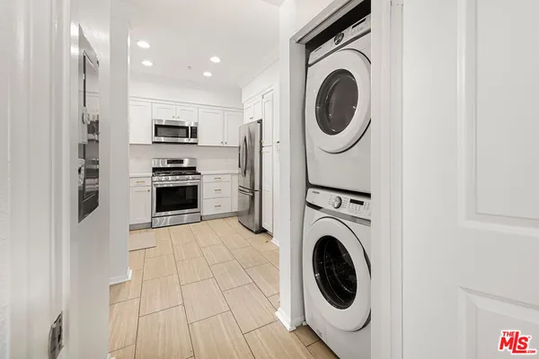 a view of kitchen and washer and dryer