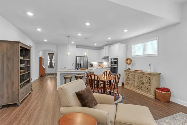 a living room with furniture and a table