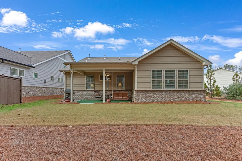 1598 Auburn Rdg Way Dacula, GA 30019 - Photo 28 of 34 a view of a house with a yard