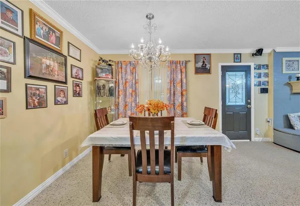 a white toilet sitting next to a bathroom