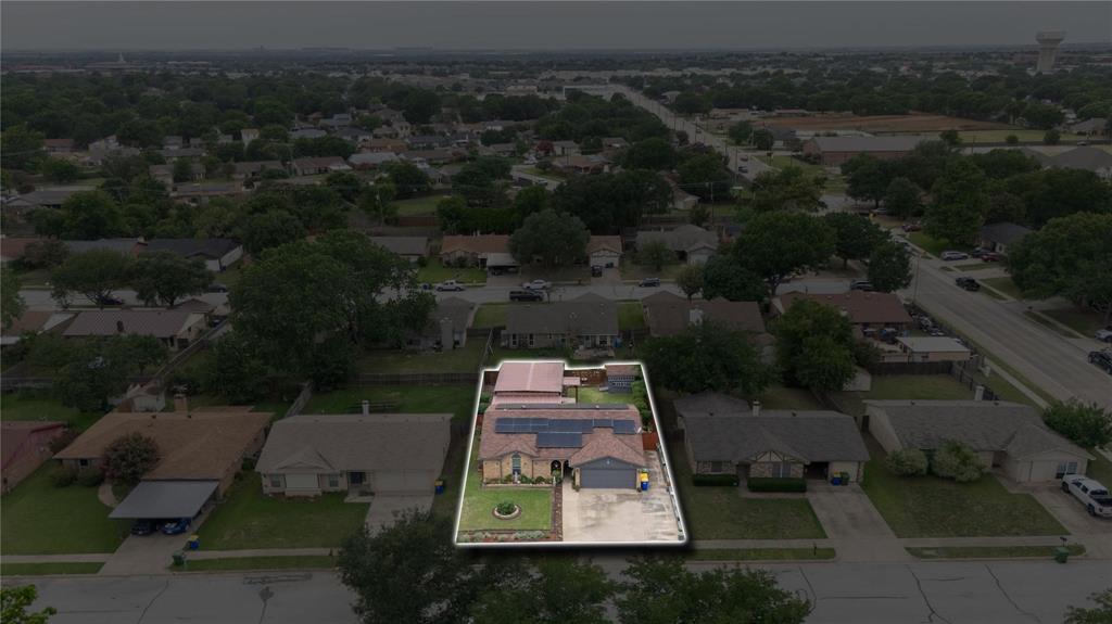 7613 Clover Lane Watauga, TX 76148 - Photo 34 of 36 Aerial view of residential area featuring property parcel outlined