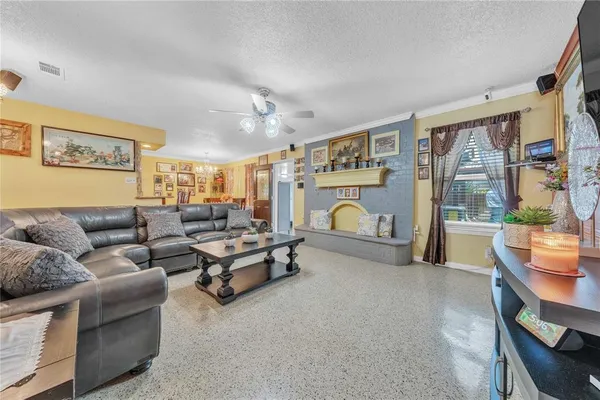 a kitchen with stainless steel appliances granite countertop wooden cabinets a sink and dishwasher