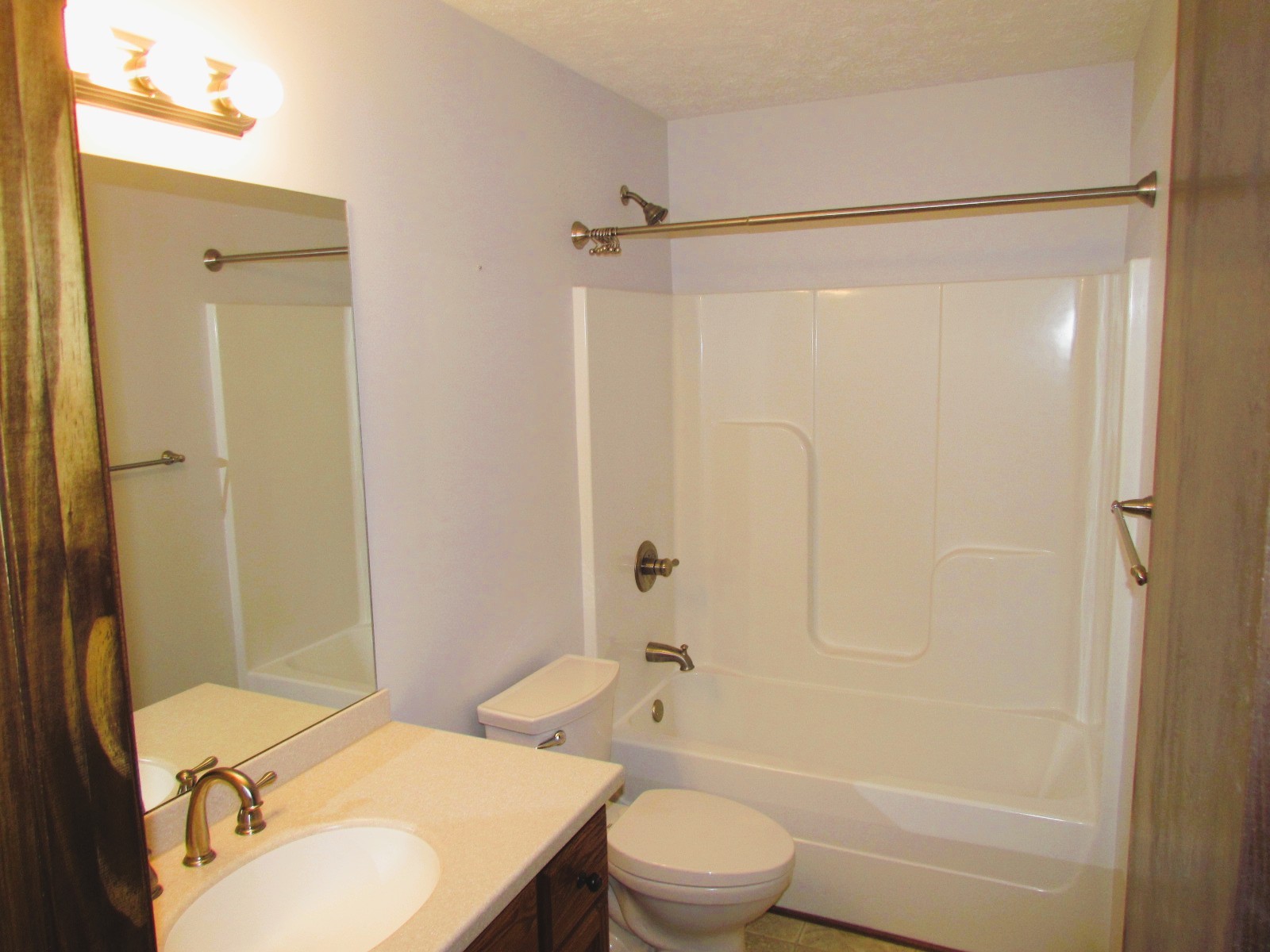 1266 Poplar Hill Road Watertown, TN 37184 - Photo 16 of 59 a bathroom with a sink toilet and shower
