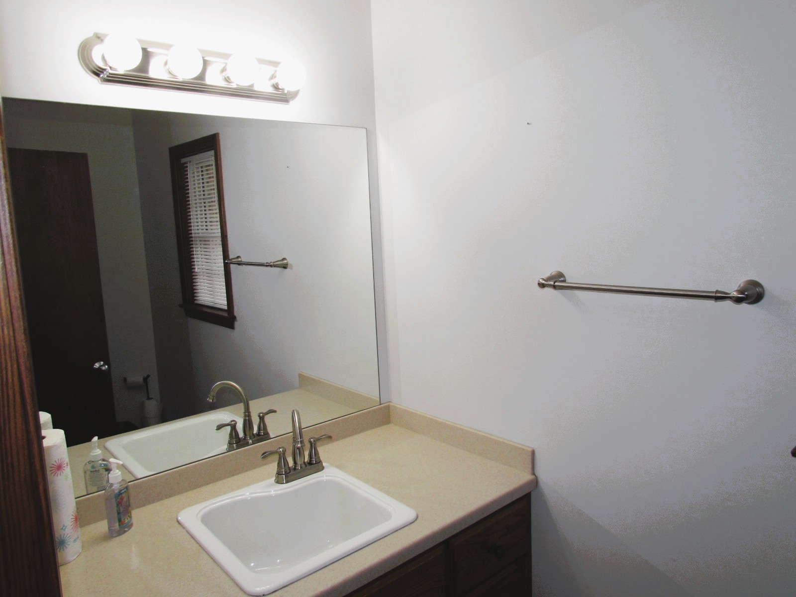 1266 Poplar Hill Road Watertown, TN 37184 - Photo 29 of 59 a bathroom with a sink and a mirror