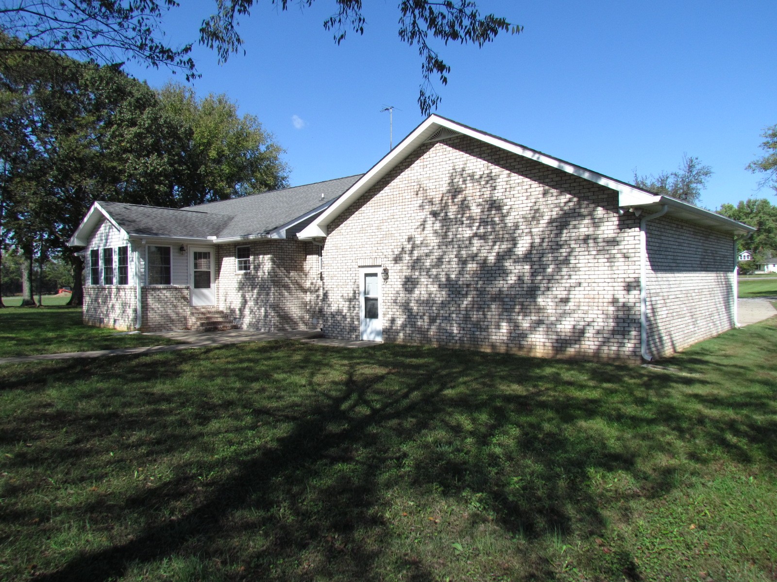 1266 Poplar Hill Road Watertown, TN 37184 - Photo 40 of 59 a view of a house with a yard