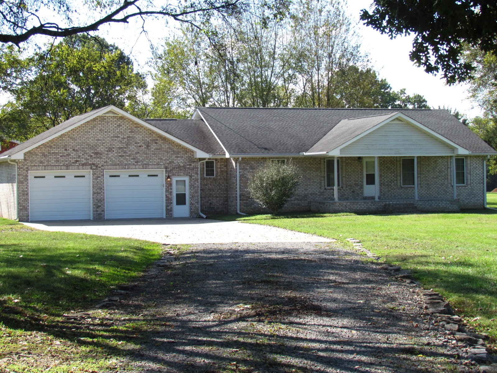 1266 Poplar Hill Road Watertown, TN 37184 - Photo 4 of 59 a house with a yard