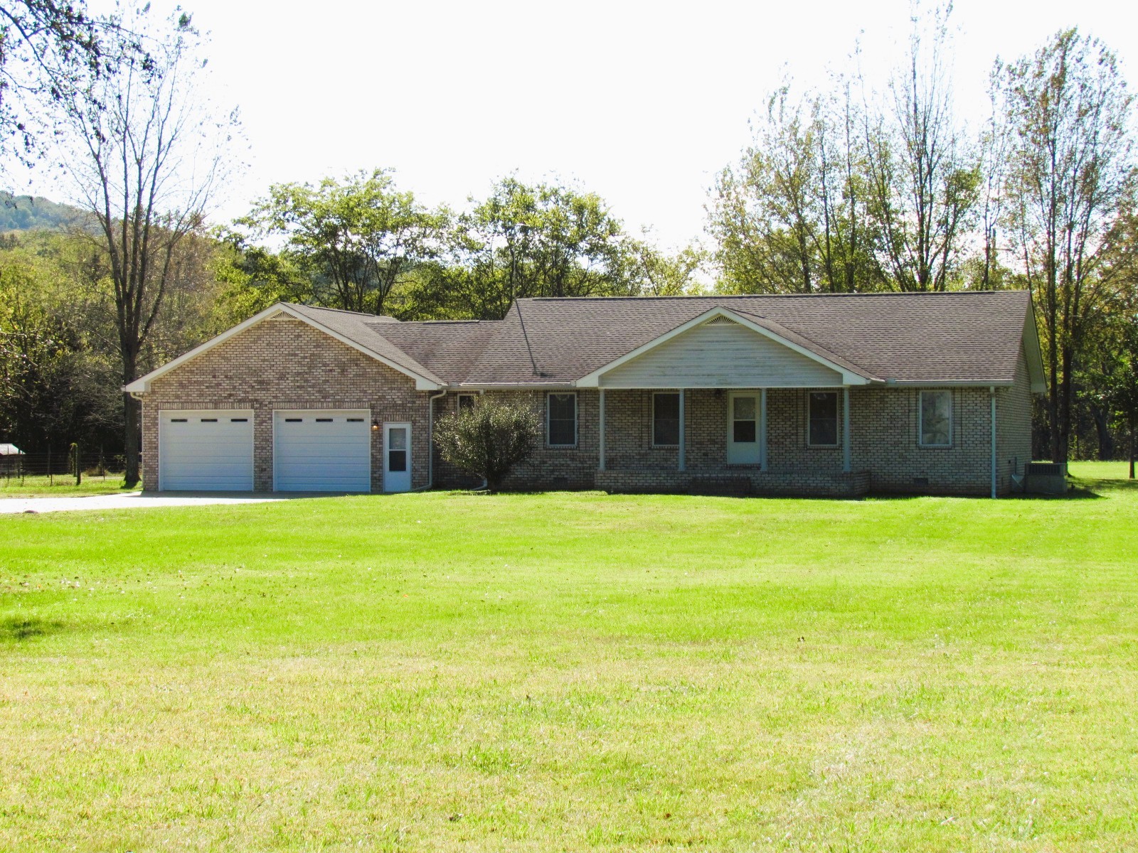 1266 Poplar Hill Road Watertown, TN 37184 - Photo 42 of 59 a front view of a house with a garden