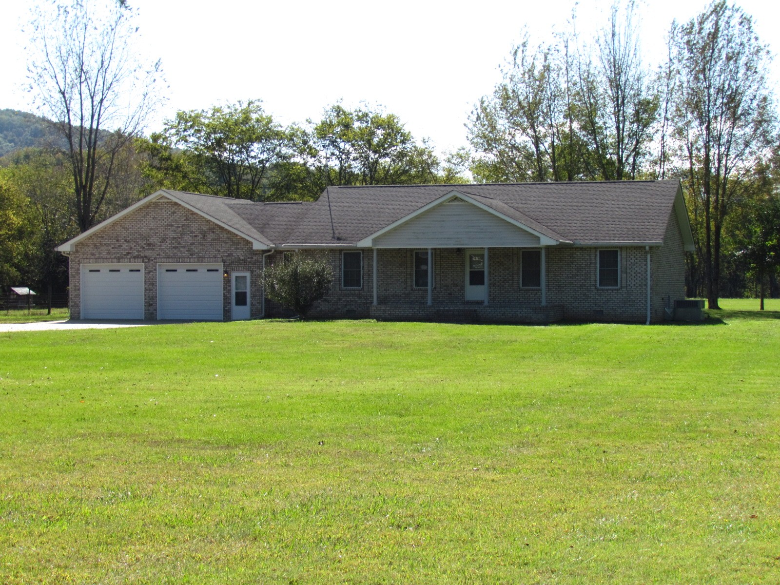 1266 Poplar Hill Road Watertown, TN 37184 - Photo 44 of 59 a front view of a house with a garden