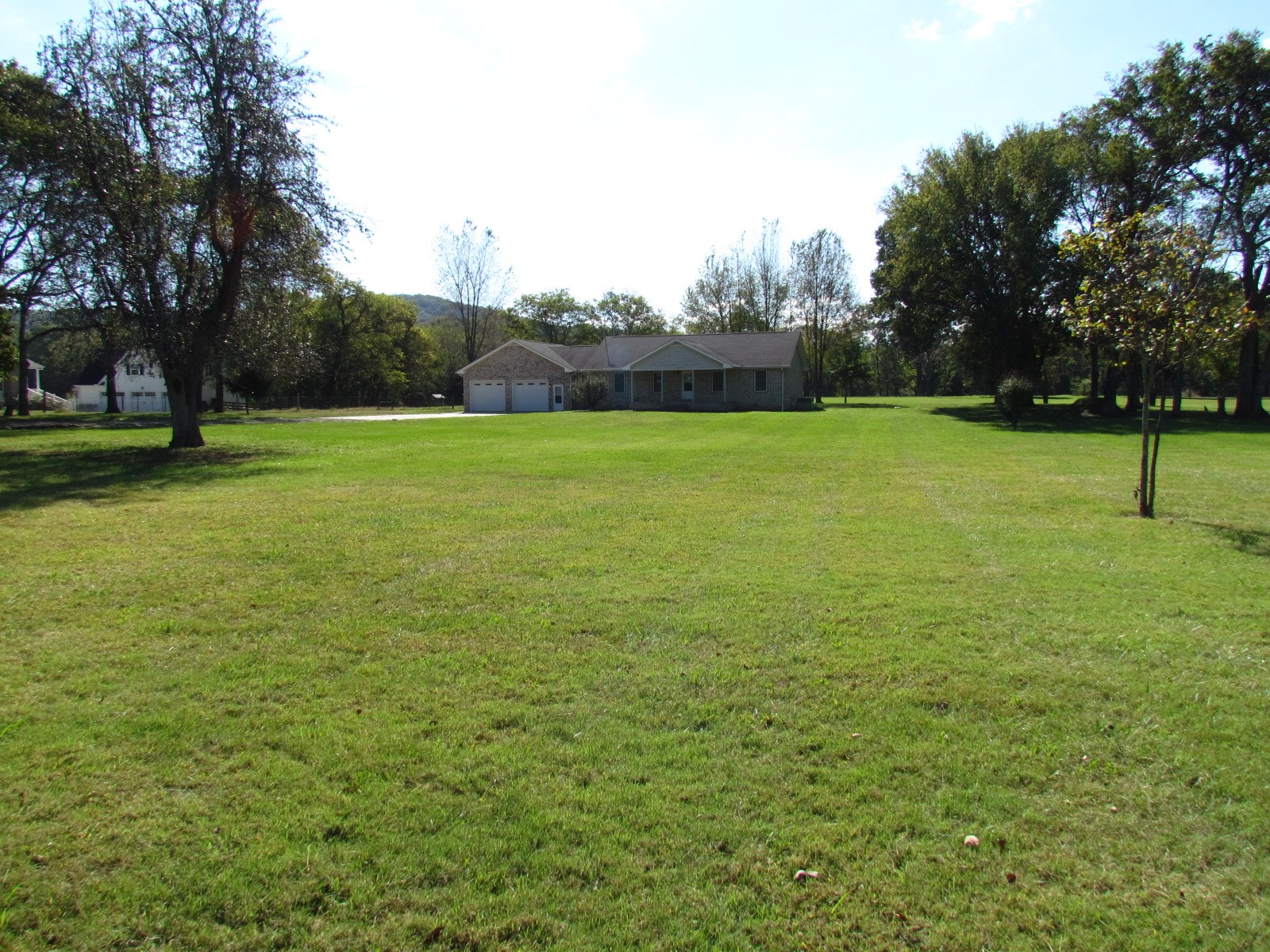 1266 Poplar Hill Road Watertown, TN 37184 - Photo 45 of 59 a view of a field of grass and trees