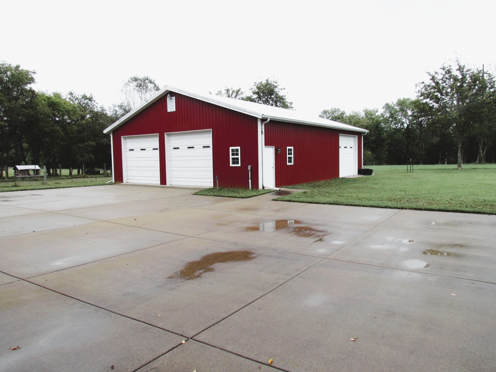 1266 Poplar Hill Road Watertown, TN 37184 - Photo 54 of 59 a front view of a house with a yard and garage