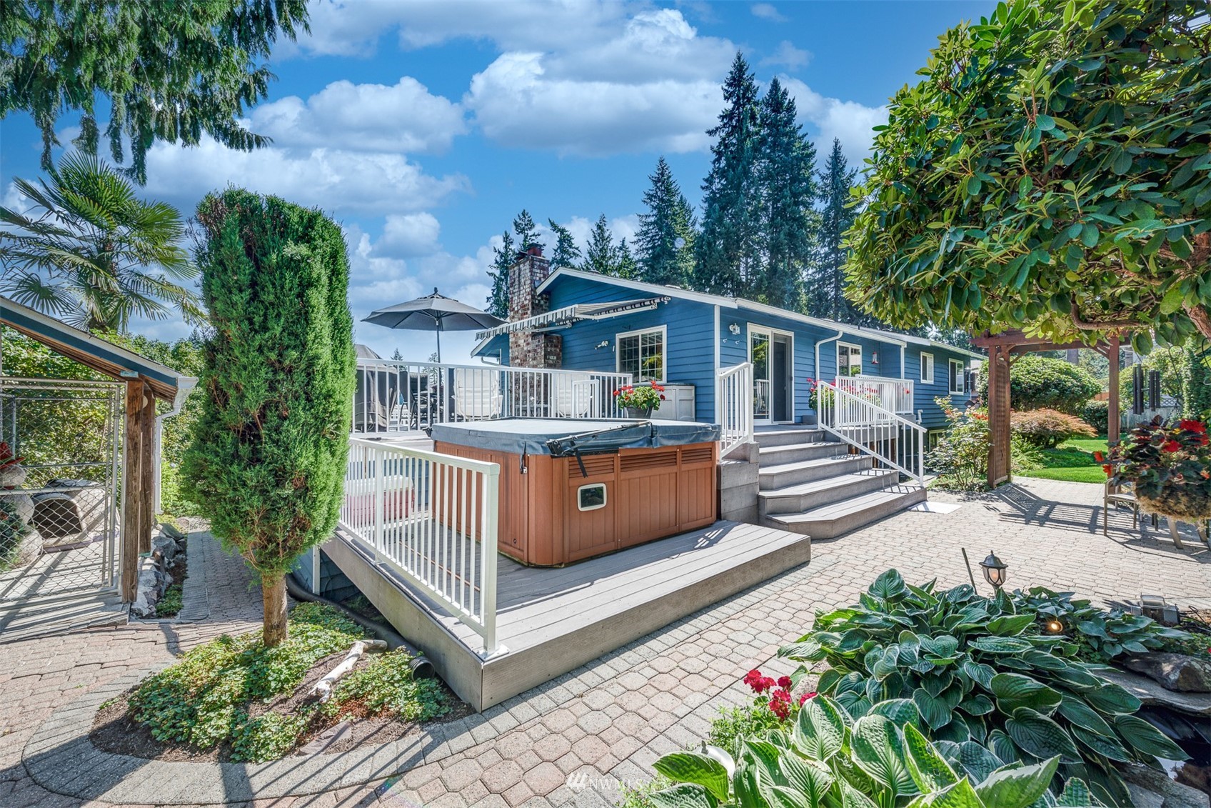 213 155th Place Southeast Bothell, WA 98012 - Photo 28 of 37 a front view of a house with a garden