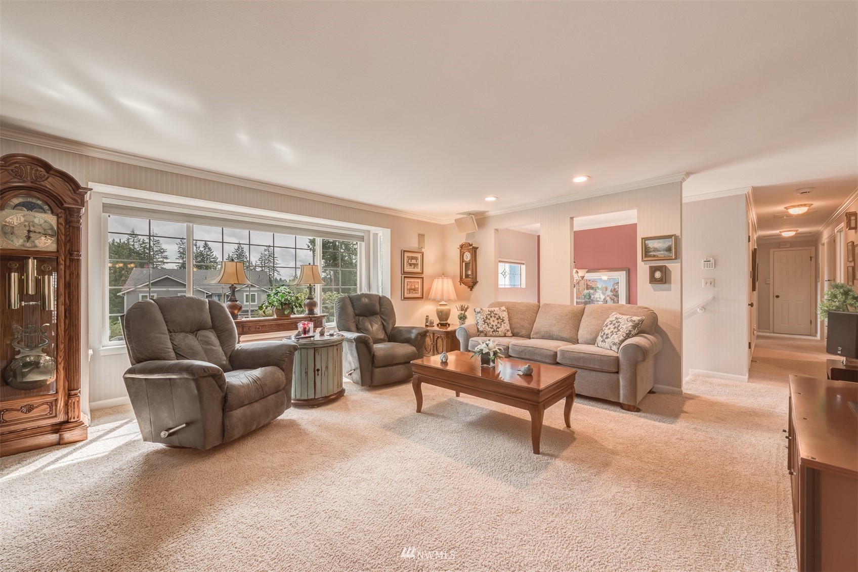 213 155th Place Southeast Bothell, WA 98012 - Photo 5 of 37 a living room with furniture and a large window