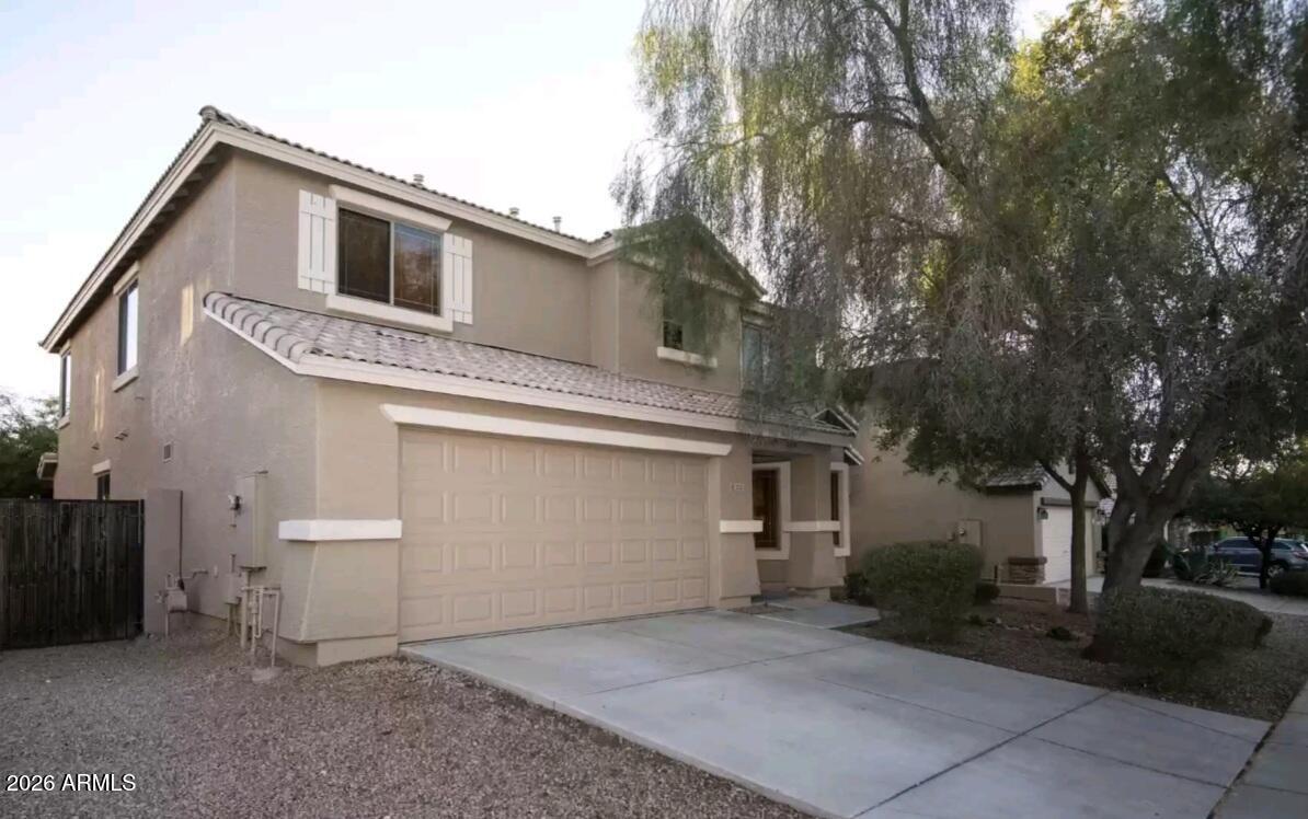 2321 West Steed Ridge Phoenix, AZ 85085 - Photo 14 of 14 front view of a house with a yard