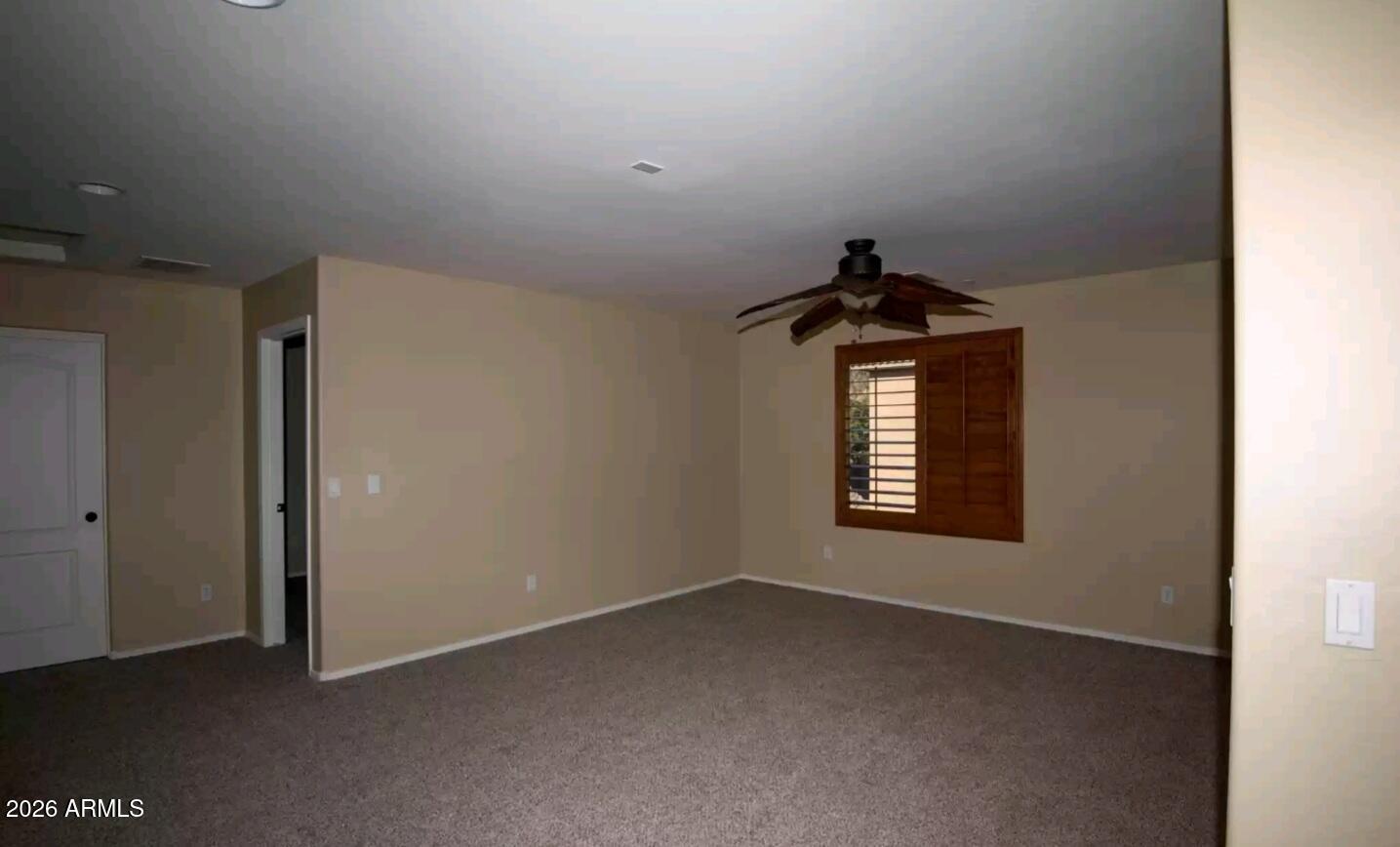 2321 West Steed Ridge Phoenix, AZ 85085 - Photo 9 of 14 a view of empty room with windows
