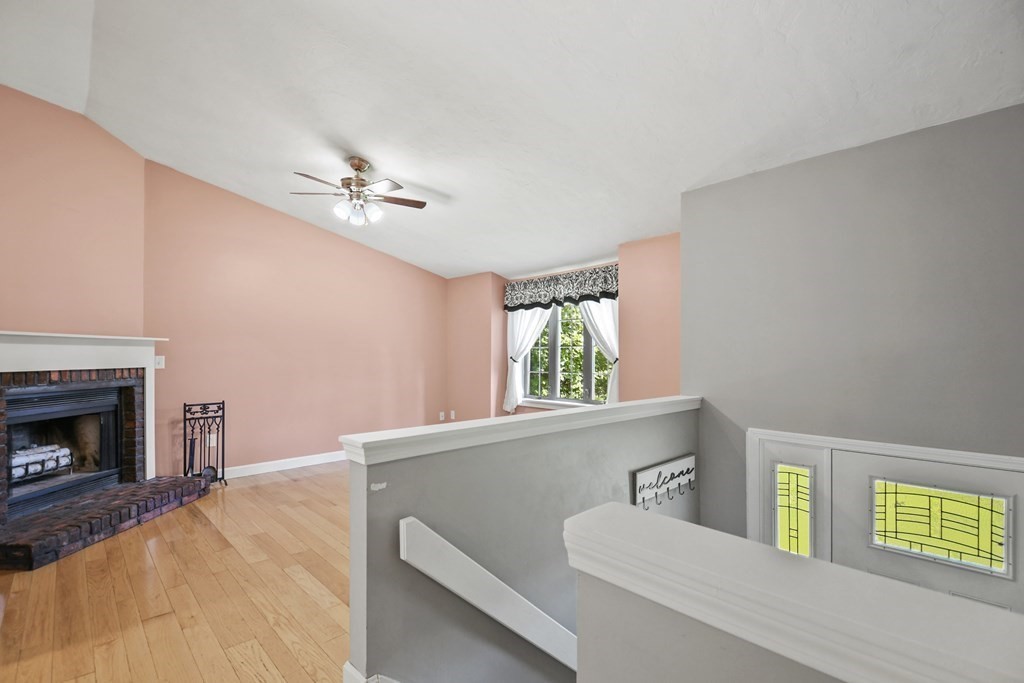 73 Hill Road Charlton, MA 01507 - Photo 2 of 32 a living room with furniture and a fireplace