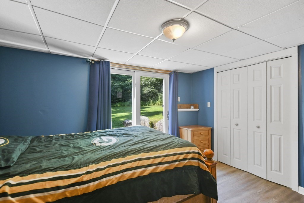 73 Hill Road Charlton, MA 01507 - Photo 22 of 32 a bedroom with a bed and a window