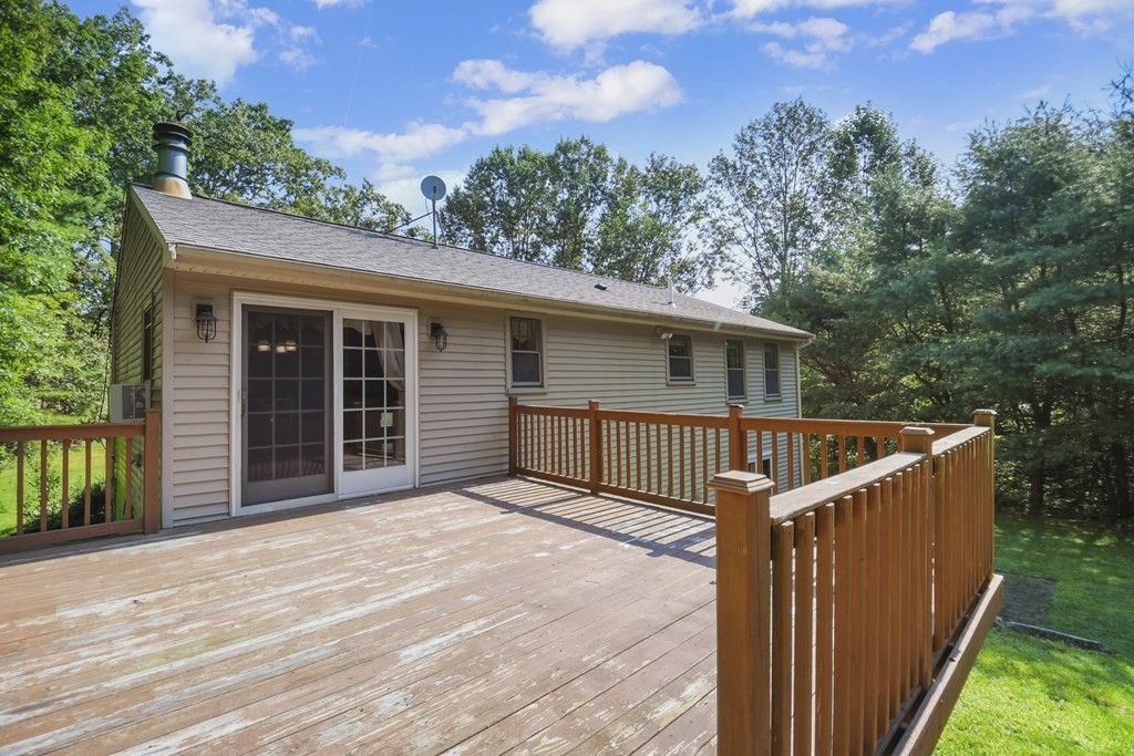73 Hill Road Charlton, MA 01507 - Photo 30 of 32 a view of a house with wooden fence