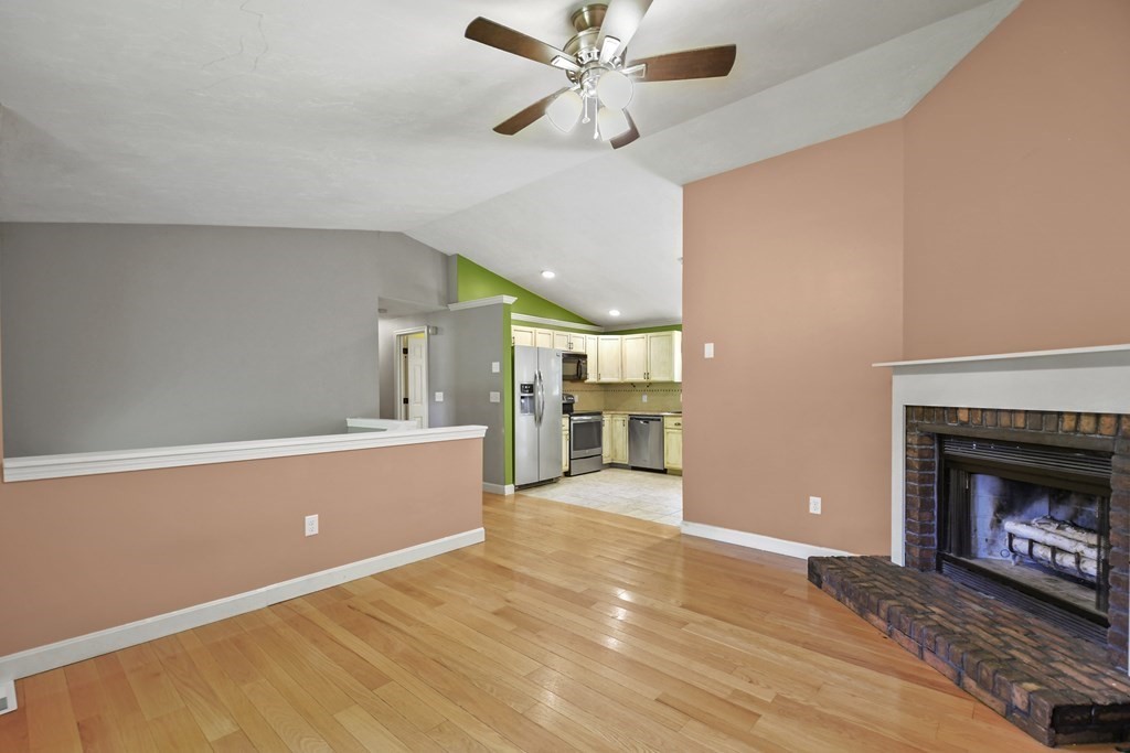 73 Hill Road Charlton, MA 01507 - Photo 4 of 32 a living room with furniture and a fireplace