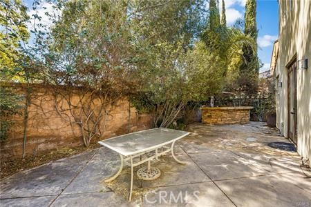 28 Secret Garden Irvine, CA 92620 - Photo 14 of 38 a view of backyard with outdoor seating