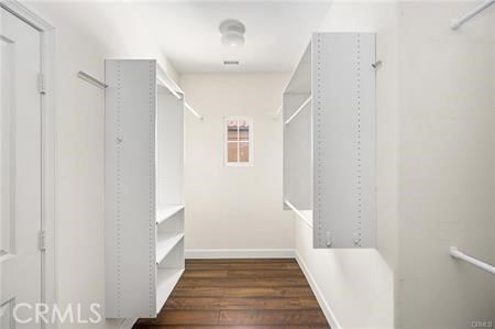 28 Secret Garden Irvine, CA 92620 - Photo 21 of 38 a view of a hallway with wooden floor and entryway