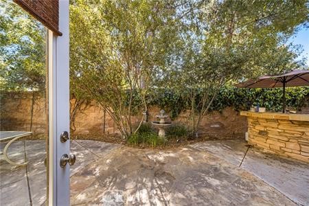 28 Secret Garden Irvine, CA 92620 - Photo 27 of 38 a view of a yard with wooden fence