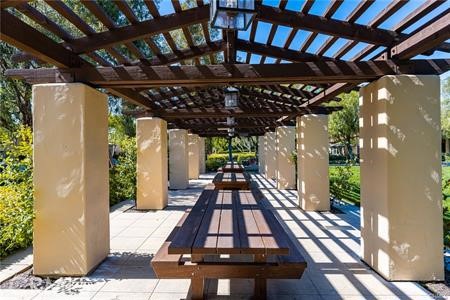 28 Secret Garden Irvine, CA 92620 - Photo 30 of 38 a view of a porch with furniture and a yard
