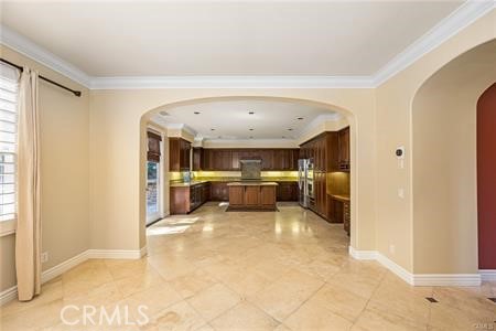 28 Secret Garden Irvine, CA 92620 - Photo 5 of 38 a view of a kitchen with a sink and dishwasher with a fireplace