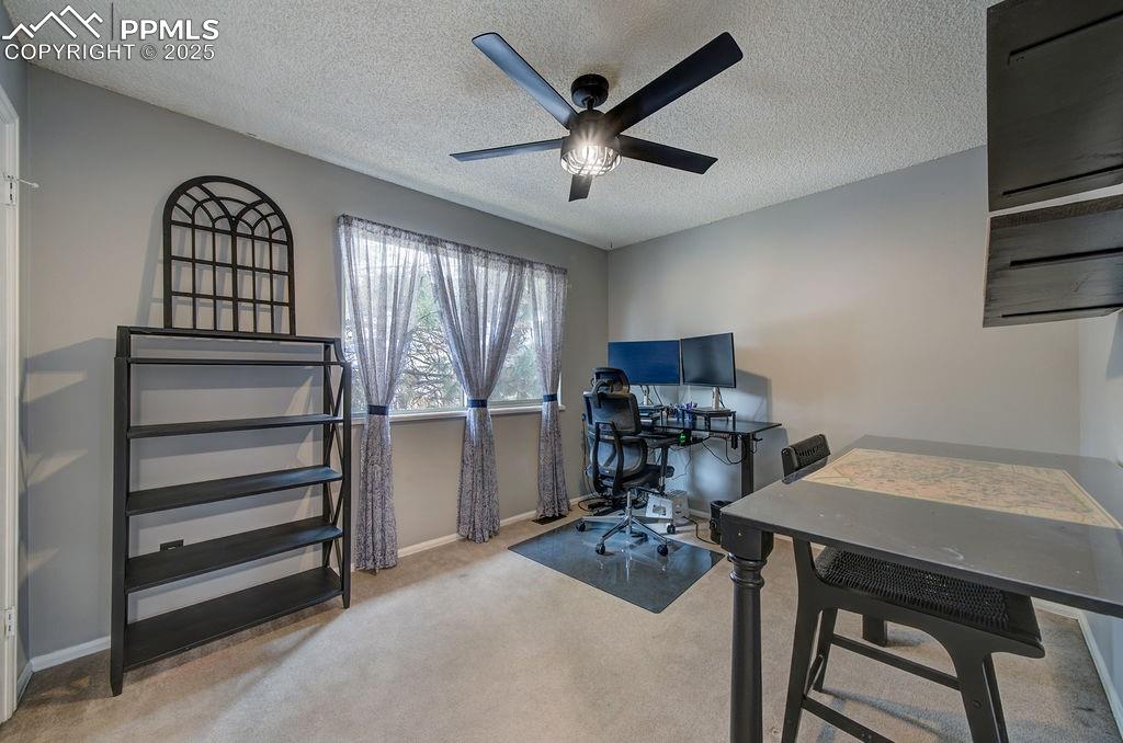 2012 Erin Loop Colorado Springs, CO 80918 - Photo 37 of 48 a workspace with furniture and window