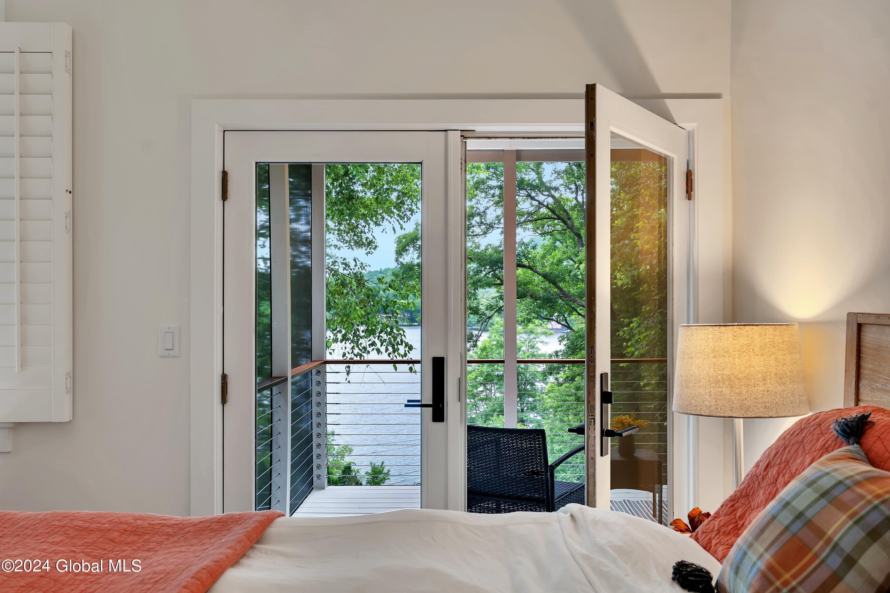 84 Fitzgerald Road Queensbury, NY 12804 - Photo 23 of 49 screen porch bed 2