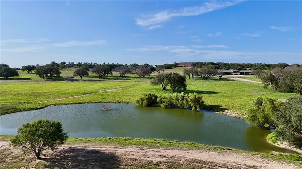 a view of a lake with a beach