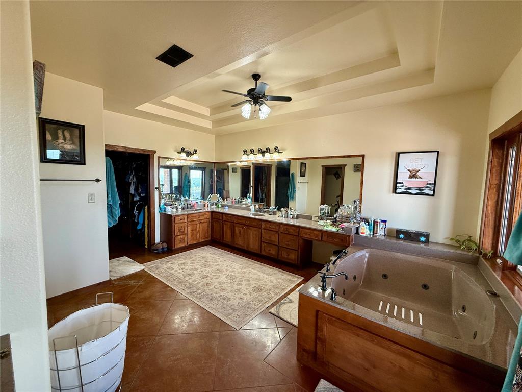 12300 County Road 367 May, TX 76857 - Photo 14 of 40 a living room with furniture and a flat screen tv