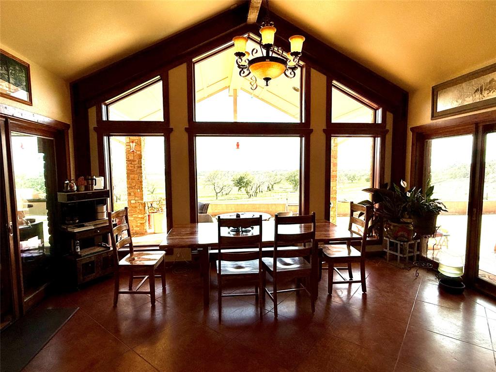 12300 County Road 367 May, TX 76857 - Photo 8 of 40 a view of a dining room with furniture window and wooden floor