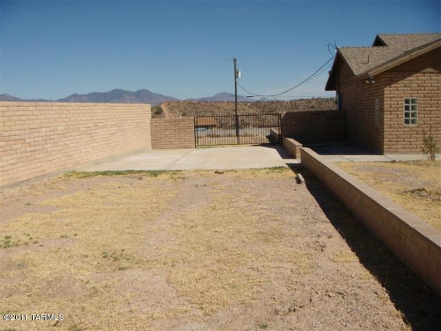 940 Paseo Escoba Rio Rico, AZ 85648 - Photo 18 of 25 a view of a terrace with wooden floor and a lake view