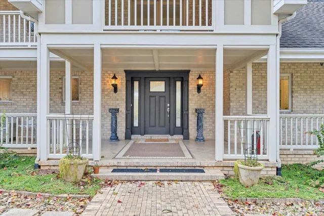a view of a large window with wooden floor
