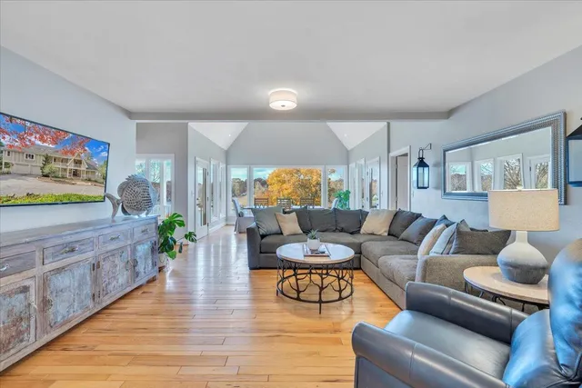 a view of balcony with wooden floor