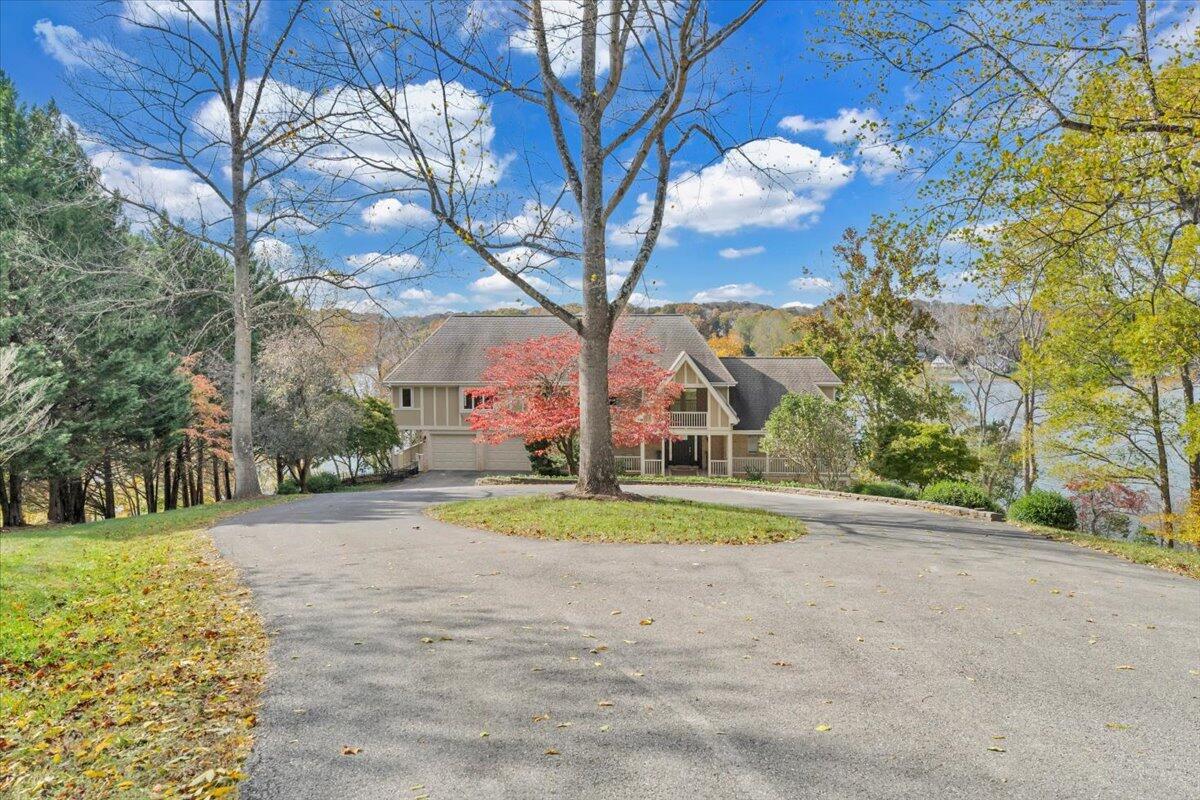 6641 Horseshoe Bend Road Goodview, VA 24095 - Photo 171 of 181 a house with trees in the background