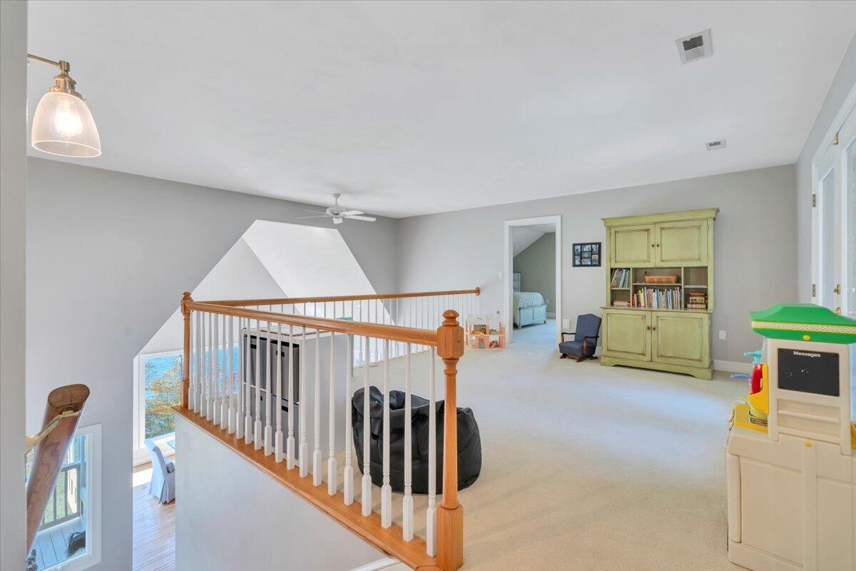 6641 Horseshoe Bend Road Goodview, VA 24095 - Photo 74 of 181 uper living room w/ balcony water view
