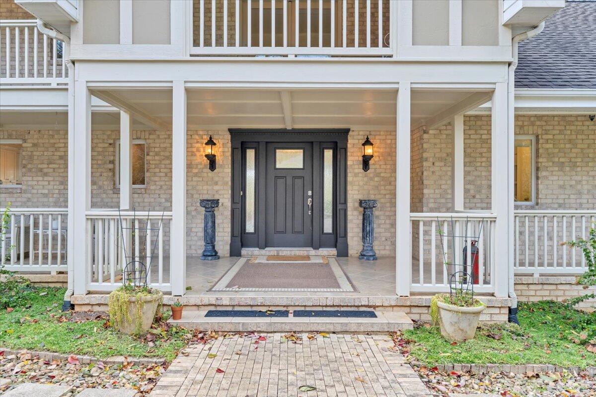 6641 Horseshoe Bend Road Goodview, VA 24095 - Photo 10 of 181 Covered porch with new doors