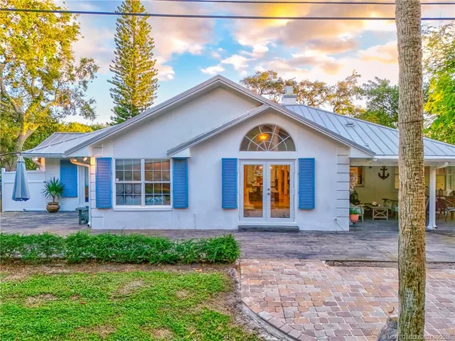 a view of a bedroom with bed and closet