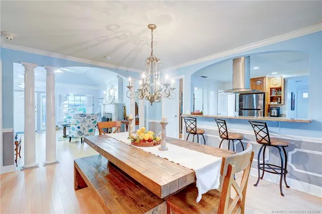 a bedroom with a bed and ceiling fan