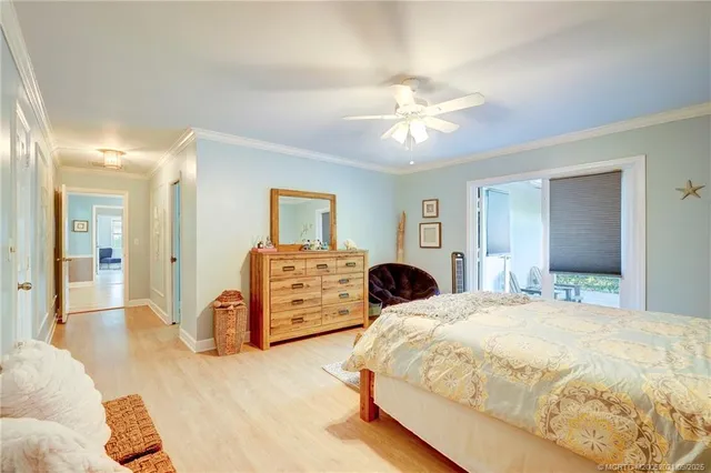 a bathroom with a toilet a sink and a window