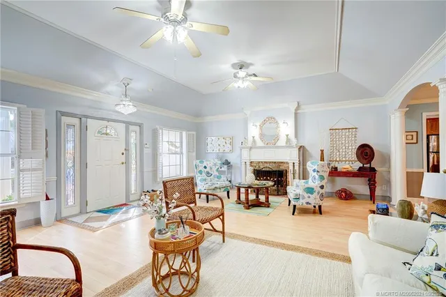 a spacious bedroom with two beds and a window