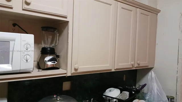 a view of cabinets and dresser