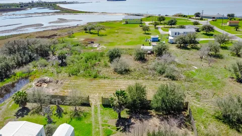 a view of a lake with a big yard