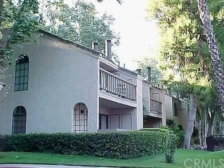 600 Central, Unit 396 Riverside, CA 92507 - Photo 1 of 1 a front view of a house with garden